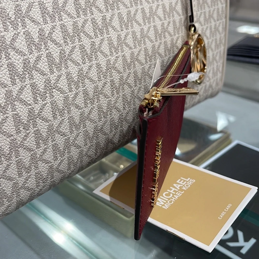 MICHAEL KORS
Jet Set Travel Medium Top Zip Leather Card Case Wallet
Dark Cherry - Picture 10 of 16